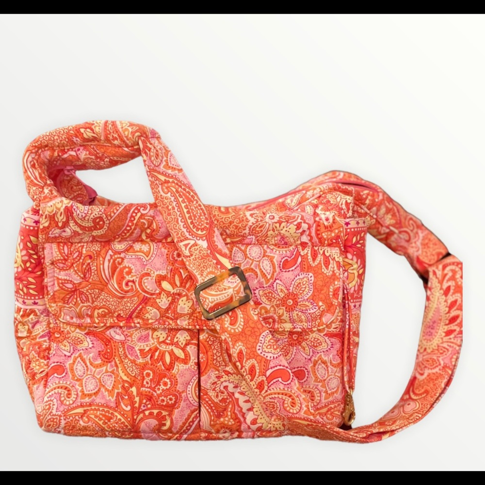 Vintage quilted Vera Bradley bag with a pink, orange, & yellow paisley print.